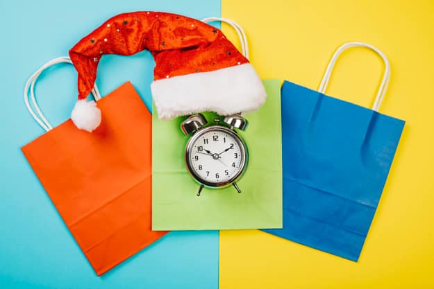 christmas-sales-concept-with-hat-alarm_23-2147730825